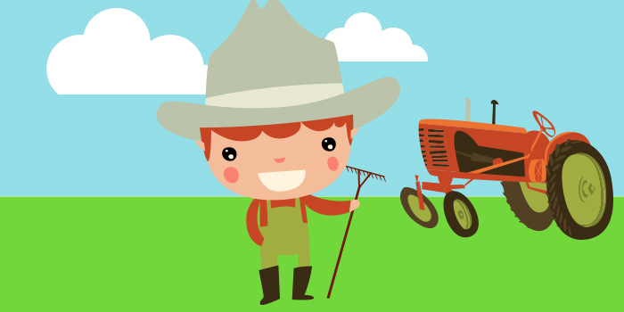 Farmer on his land near a tractor blue sky